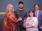 Rebecca Wray receives the Gerard Finnegan Memorial Cup from Maire Finnegan at NWRC's Best in FE celebrations. Also pictured are special guest Danny Quigley and NWRC Principal and Chief Executive Leo Murphy.