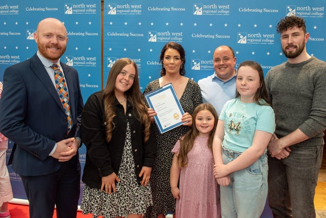 Amanda Courtney, husband Paul, children Hannah, Emily and Bethany, pictured with BBC's Barra Best and special guest Danny Quigley during North West Regional College's Best in FE celebrations.