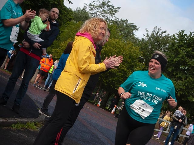 Emma Boyd (47) is cheered on during Sunday's DQF 'Try-a Tri' Triathlon at Templemore. (Photo: Jim McCafferty)