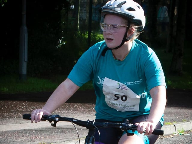 Courtney Cowan makes her way onto Buncrana Road for the cycling part of Sunday's Triathlon. (Photo: Jim McCafferty Photography)