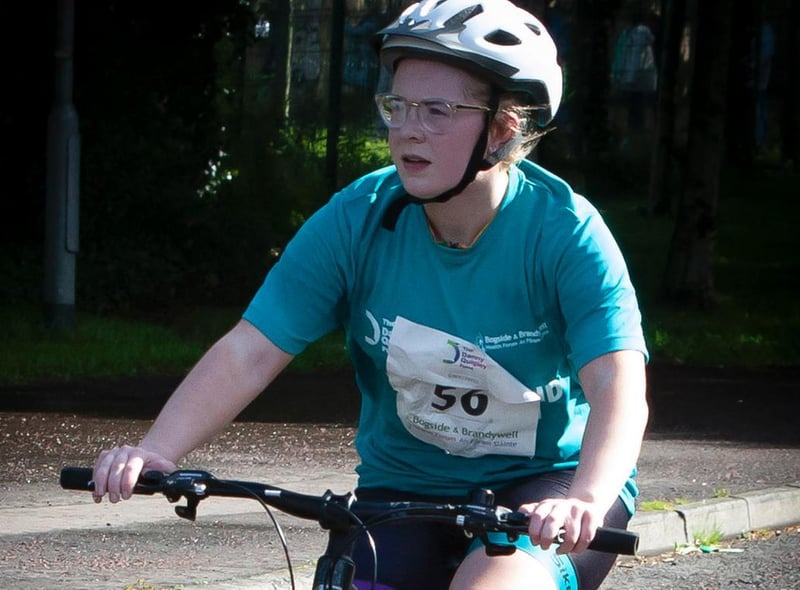 Courtney Cowan makes her way onto Buncrana Road for the cycling part of Sunday's Triathlon. (Photo: Jim McCafferty Photography)