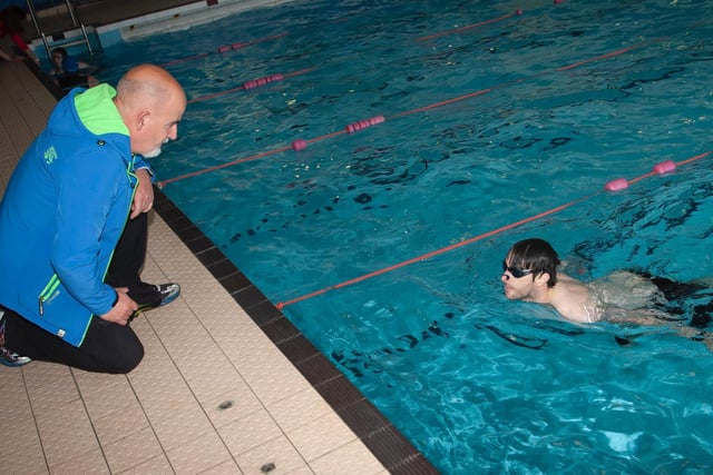 James Edwards gets some information from dad Sam during his time in the pool at Sunday's Triathlon at Templemore Sports Complex. (Photo: Jim McCafferty)