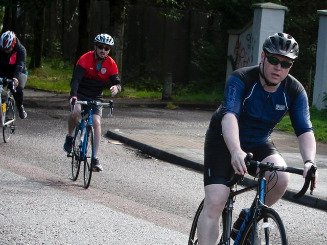Triathletes make their way out onto Buncrana Road during Sunday's Triathlon. (Photo: Jim McCafferty)