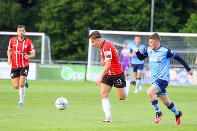 Derry City striker Mattie Smith on the attack against UCD in Dublin on Friday night. Photograph by Kevin Moore.