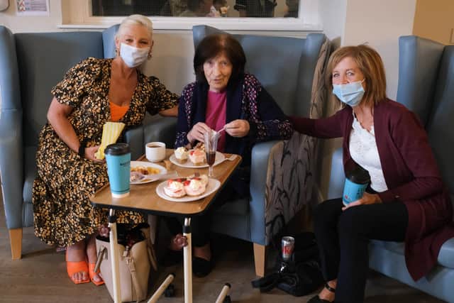 A resident of Oakleaves with family and friends. Picture by John Stafford / PressEye