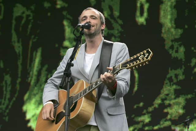LONDON - Fran Healy from Travis performs on stage at "Live 8 London" in Hyde Park on July 2, 2005 in London, England. The free concert was one of ten simultaneous international gigs including Philadelphia, Berlin, Rome, Paris, Barrie, Tokyo, Cornwall, Moscow and Johannesburg. The concerts preceded the G8 summit (July 6-8) to raising awareness for MAKEpovertyHISTORY. (Photo by Jo Hale/Getty Images)