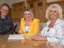 Derry City and Strabane District Council Mayor, Councillor Sandra Duffy and artist Chris Wilson pictured with the Factory Girls spokesperson  Mary White. Picture Martin McKeown.