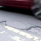Potholes are to be repaired following the award of road surfacing contracts.
