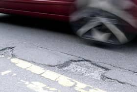 Potholes are to be repaired following the award of road surfacing contracts.