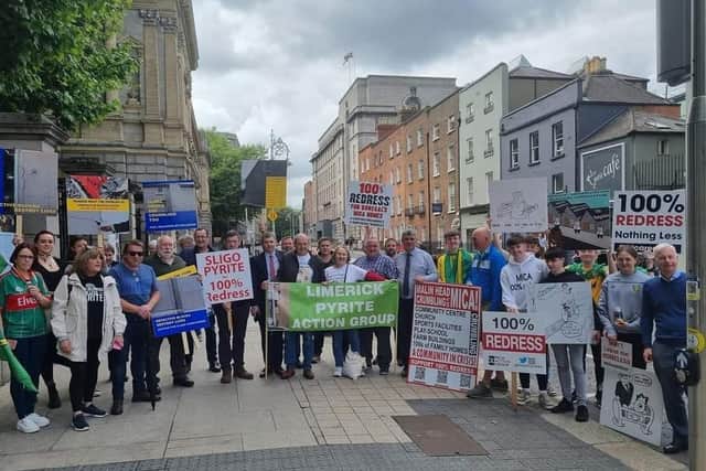 Homeowners and campaigners pictured outside Dail Eireann last week. Picture: Ali Farren.