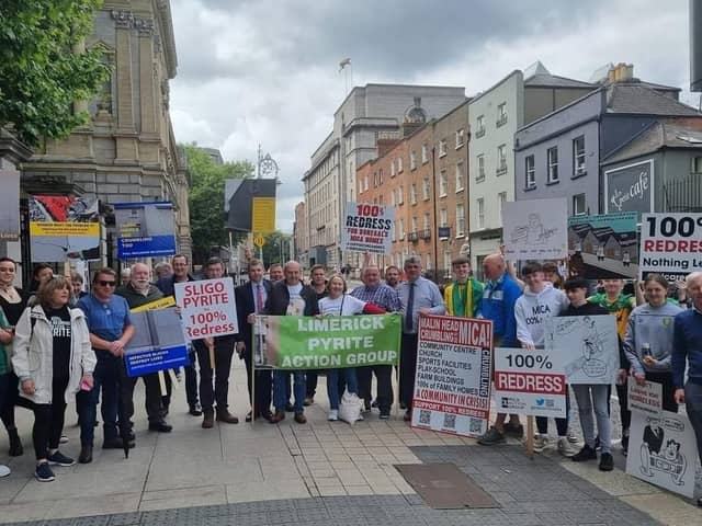 Homeowners and campaigners pictured outside Dail Eireann last week. Picture: Ali Farren.