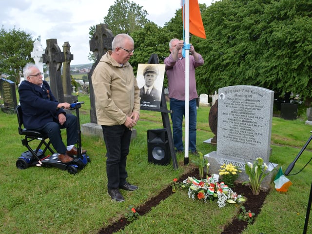 Archie Fleming laying flowers on behalf of the Derry Graves Association