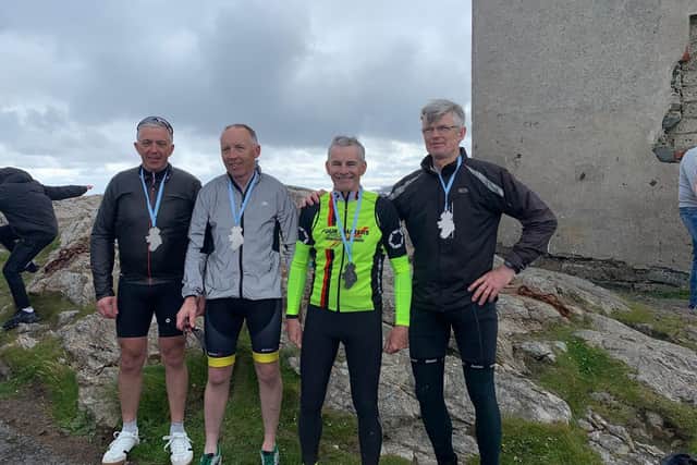 Cathal Wilson, Chris Shivey, Patrick Mornin and Robert Kavanagh at Malin Head.