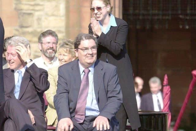 May 2001... Chelsea Clinton greets the crowd that gathered at Guildhall Sq. for the visit of her father. Included are Gerry Adams and Pat and John Hume.