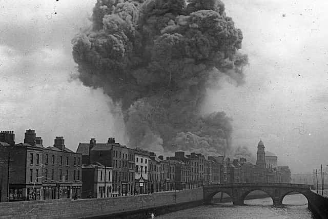 Dublin in flames following the shelling of the anti-Treaty garrison in the Four Courts by Free State forces.