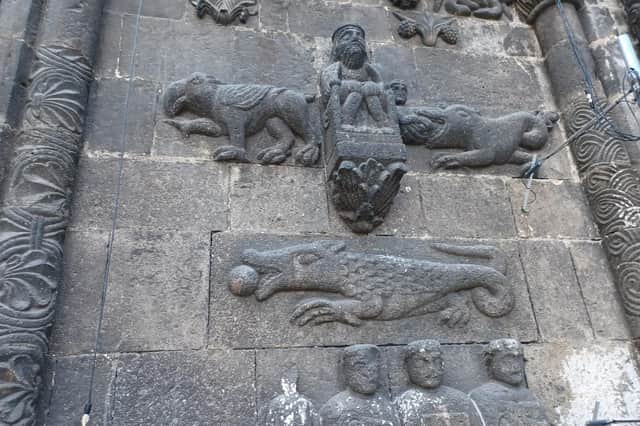 Stone carvings on the Irish monastery of St. James’ northern portal.