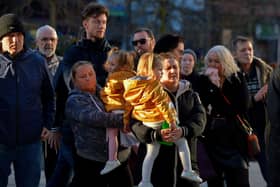 People gather in Waterloo Place for the Derry Against Fuel Poverty protest in Waterloo Square on Saturday afternoon last. Photo: George Sweeney.  DER2209GS – 074