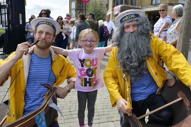 Six-year-old Myla Daly pictured with Septic Peg and One Eye Jim, from In Your Space Circus, at the Foyle Maritime Festival last week. DER2918GS052