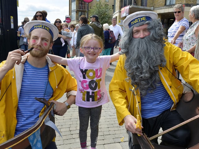 Six-year-old Myla Daly pictured with Septic Peg and One Eye Jim, from In Your Space Circus, at the Foyle Maritime Festival last week. DER2918GS052