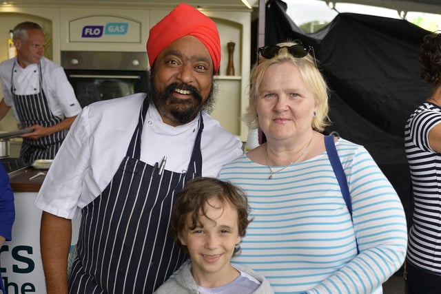 Finn McDaid and his aunt Siobhan Ashe pictured with celebrity chef Tony Singh at the Foyle Maritime Festive on Saturday afternoon last. DER2818GS054