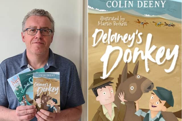 Colin Deeny with his new book.