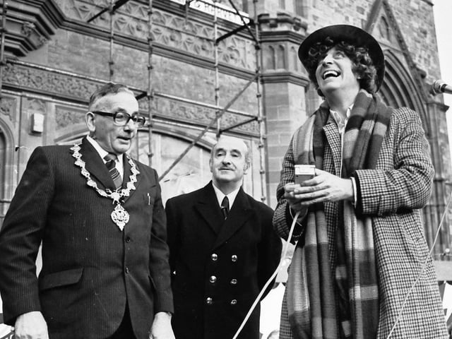 1978... TV's 'Dr Who', Tom Baker, switches on the Christmas lights at Guildhall Square,m watched by Mayor Tom Craig and Guildhall assistant superintendent Joseph Robinson.