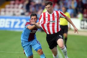 Derry's Shane McEleney and Trabzonspor's Zeki Yavru during the Europa League Second Qualifying Round 2nd Leg in 2013.