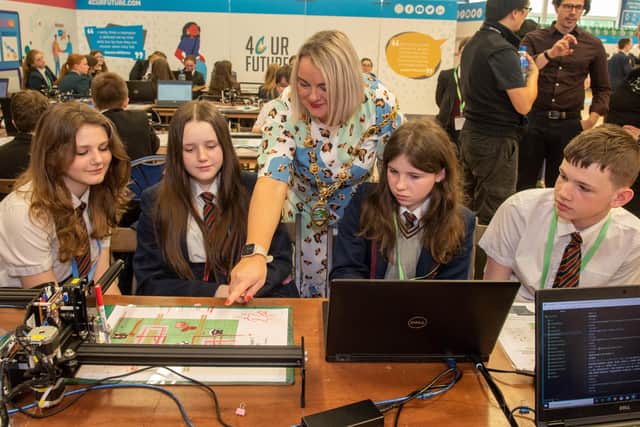 The Mayor, Councillor Sandra Duffy pictured with Oakgrove Integrated College pupils, Ebony Irwin, Elisha Holden, Ellen Curry and Ryan McCrory as Derry City and Strabane District Council hosted the 4 C UR Your Future Live, Skills Event in the Foyle Arena. Picture Martin McKeown.