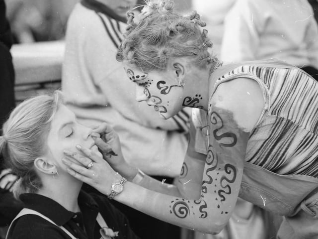 Sharon McDaid gives Martina O’Donnell, Carndonagh, a new look at the face-painting stall at the opening parade of the Carndonagh Festival.