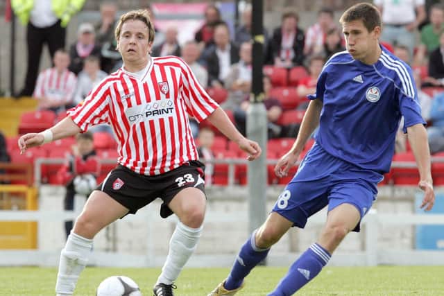 Derry City's Tam McManus passes the ball off before Skonto Riga's Vitalijs Smirnovs could challenge, during their 2009 Europa League tie. Picture by Margaret McLaughlin/INPHO