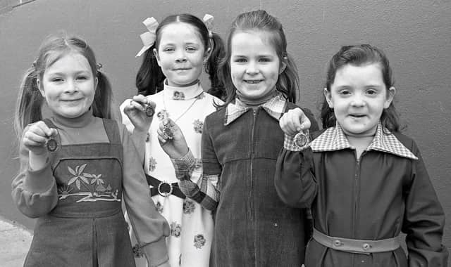 1977... Prizewinners in girls' vocal solo (under 8). From left are Marie Louise O'Kelly and Sharon Moore, who tied for third, Toni Harkin, runner-up, and Isabel Hickey, the winner.
