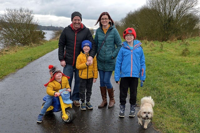 The Houston family getting some outdoor exercise in the Bay Road Park. The Bay Road Park is great for families and dogs as there is plenty of space to run and explore. DER2105GS – 031