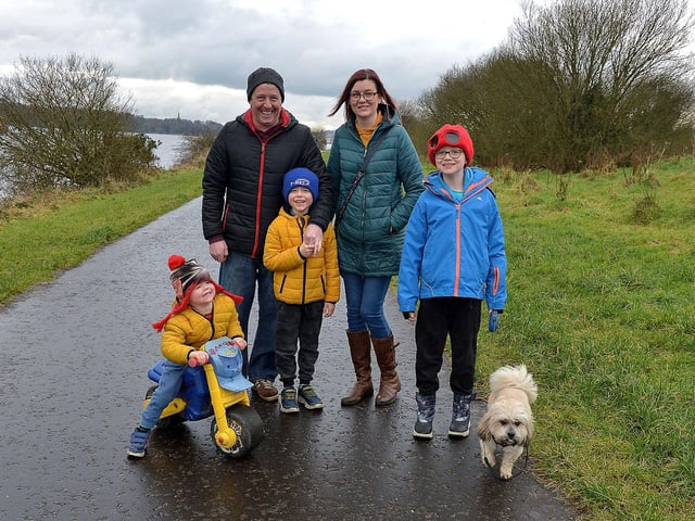 The Houston family getting some outdoor exercise in the Bay Road Park. The Bay Road Park is great for families and dogs as there is plenty of space to run and explore. DER2105GS – 031