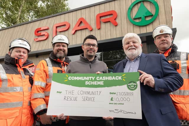 The Community Rescue Service’s (CRS) Search Technician Murrough McDonagh and District Commander Barry Torrens with SPAR Milltown Rd Store Manager David Buckley, plus CRS’s Regional Commander Sean McCarry and Assistant Unit Commander Ruari Bailey.