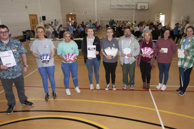 Organisers and facilitators pictured at Wednesdayâ€TMs Creggan 75th Reconnecting Lunch at Bishopâ€TMs Field Sports Hall. The event was held as part of the â€ ̃Communities in Transitionâ€TM project. From left, Glen Foley, Creggan Library, Michelle McLaren, Pink Ladies, Edelle Moore, Pink Ladies, Julie White, Old Library Trust, Tina Burke, Triax Neighbourhood Management Team, Colm Barton, TNMT, Cathy Sweeney, Dove House, Kellie McBrearty, CNP and Kyra Reynolds, TNMT.