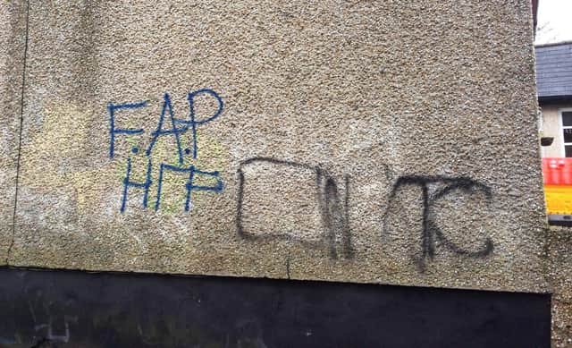 Graffiti daubed on a family home locally.