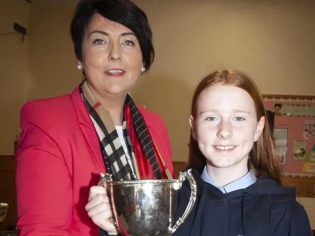 Niamh Mc Gonagle Receiving the John Parr trophy for Performing Arts from Ms. Duggan, Principal, Holybush PS.
