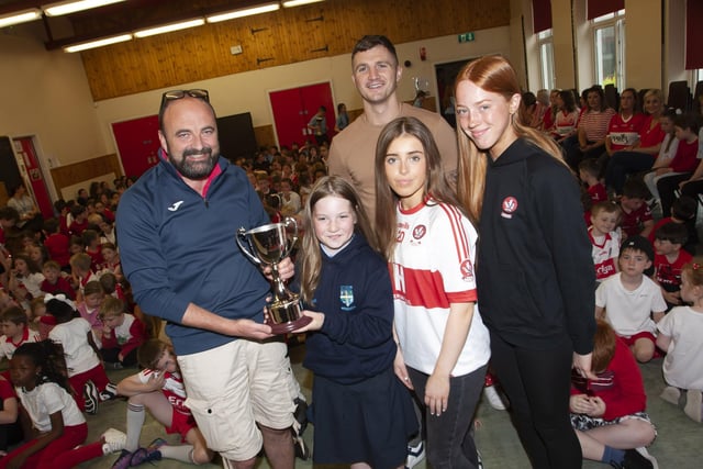 Sarah McAvoy receiving the inaugural Carmel Dunn Cup Environmental award from Mr. Feargal Friel, Vice Principal. Included are special guests Conor â'The Kid' Coyle with Annie Duffy and Rosa Gallagher, two All-Ireland winning past pupils.