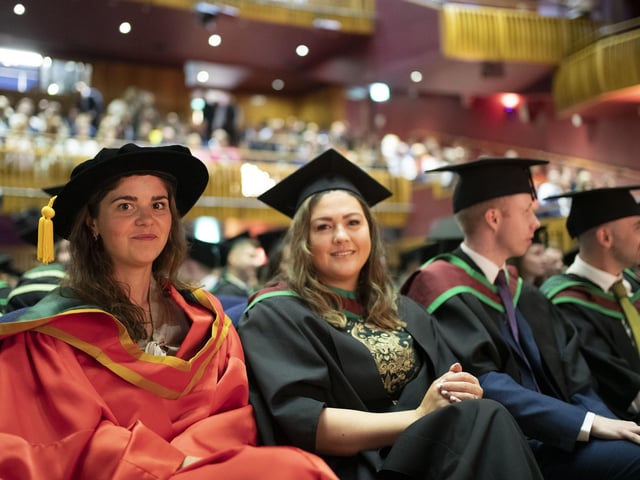 Graduates at the Millennium Forum. (Photo: Nigel mcDowell/Ulster University)