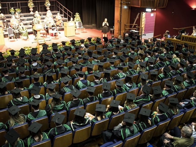 Graduates at the Millennium Forum. (Photo: Nigel mcDowell/Ulster University)