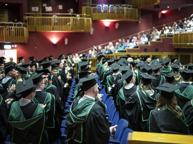 Graduates at the Millennium Forum. (Photo: Nigel mcDowell/Ulster University)