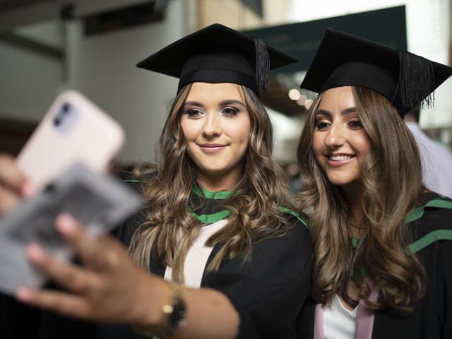 Graduates at the Millennium Forum. (Photo: Nigel mcDowell/Ulster University)