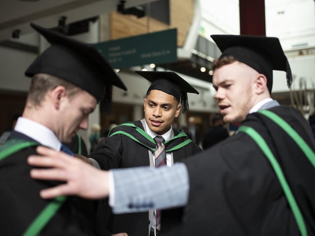Graduates at the Millennium Forum (Photo: Nigel mcDowell/Ulster University)