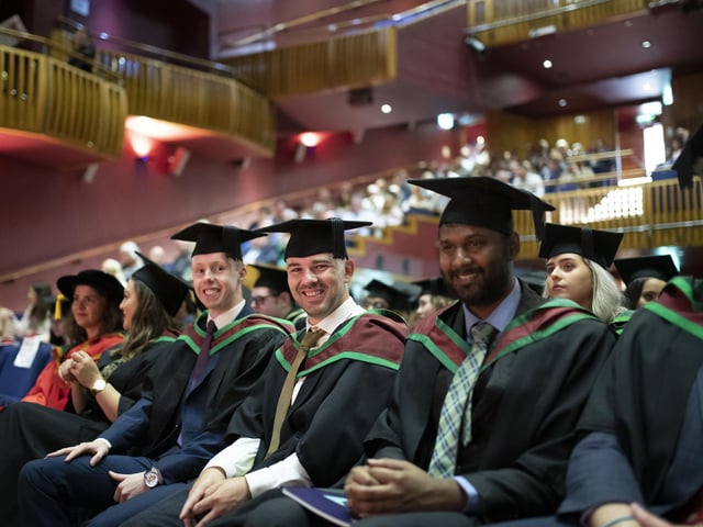 Graduates at the Millennium Forum. (Photo: Nigel mcDowell/Ulster University)