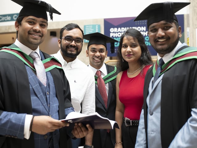 Graduates at the Millennium Forum. (Photo: Nigel mcDowell/Ulster University)