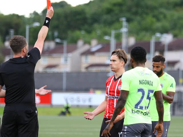 Matty Smith is shown a straight red after a confrontation with Riga's Ngonda in the second half of the Europa Conference League tie at Brandywell. Photo by Kevin Moore.
