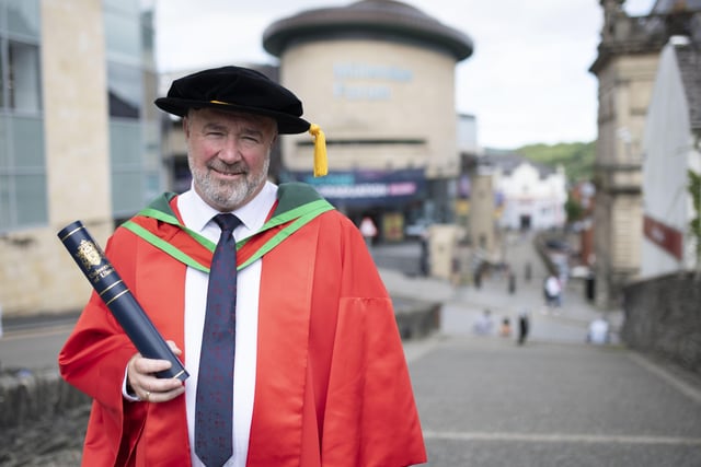 honorary graduate, John Shiels, Chief Executive of Manchester United Foundation, who was also conferred in Derry.(Photo: Nigel mcDowell/Ulster University)