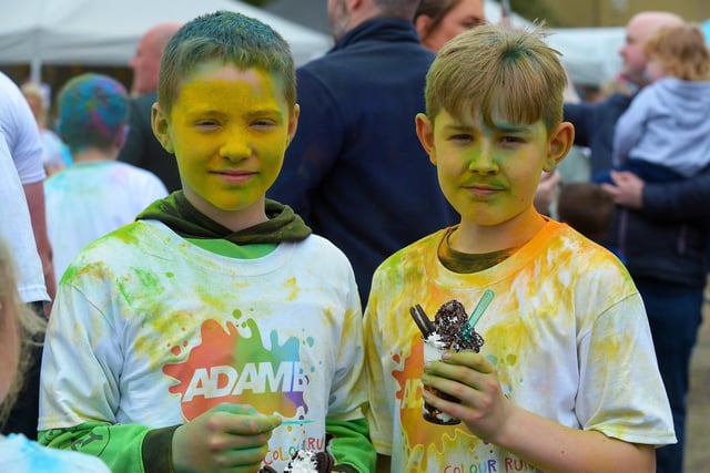 Two young lads enjoy an ice cream after the Adam B Charity Children’s Colour Run at the Templemore Sports Complex on Saturday afternoon last. Photograph: George Sweeney.  DER2227GS – 005