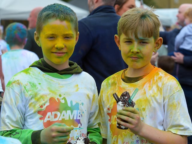 Two young lads enjoy an ice cream after the Adam B Charity Children’s Colour Run at the Templemore Sports Complex on Saturday afternoon last. Photograph: George Sweeney.  DER2227GS – 005