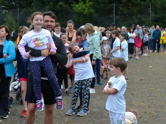 Fans queue to meet Adam B at his Charity Colour Run at the Templemore Sports Complex on Saturday afternoon last. Photograph: George Sweeney. DER2227GS – 006